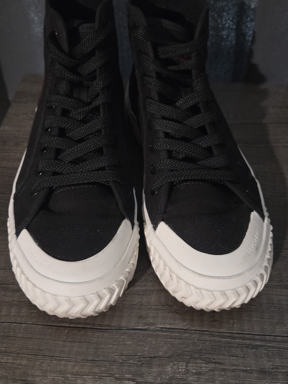 Skechers Black High-Top Sneakers with White Toe and Sole